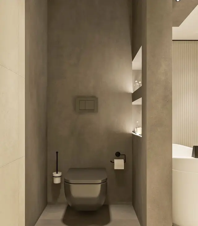 Bagno di servizio con intonaco decorativo effetto cemento