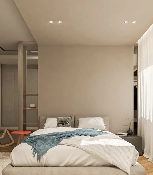 Master bedroom in soft tones with recessed lighting