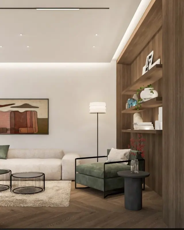 Living room with custom bookcase and green armchair