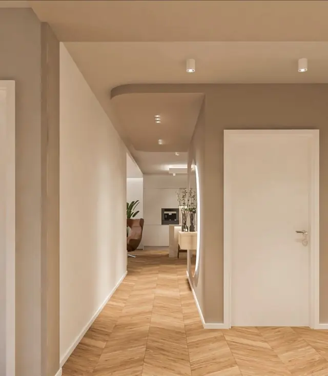 Hallway painted taupe with herringbone parquet