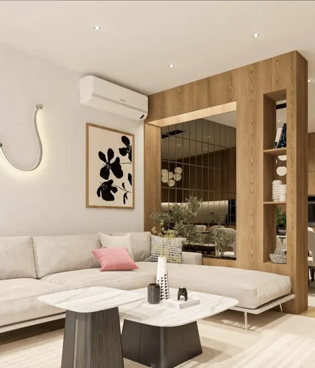 Living room with wooden screen and mirrors